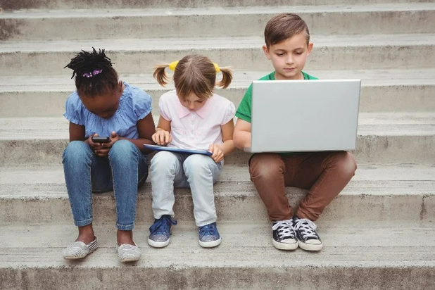 kids on their devices